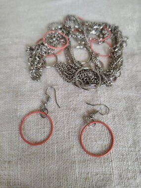 Long multi chain necklace with silver tone & peach circles + earrings